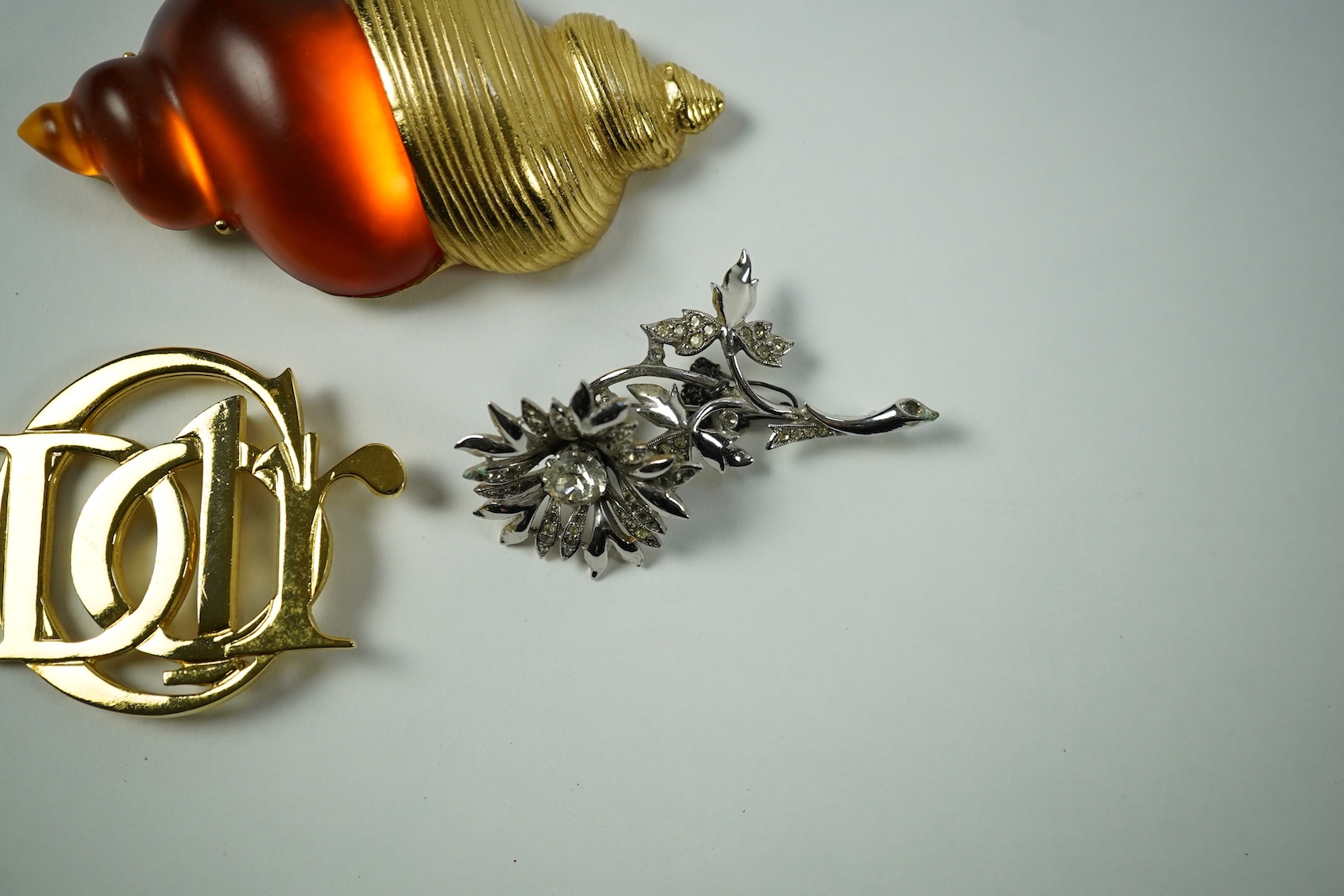 Three Christian Dior costume jewellery brooches